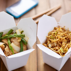 chinese take out food in boxes close up with mobil 2026 01 06 09 57 05 utc