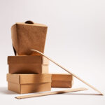 chopsticks in paper packaging near takeaway boxes 2026 03 11 04 17 49 utc