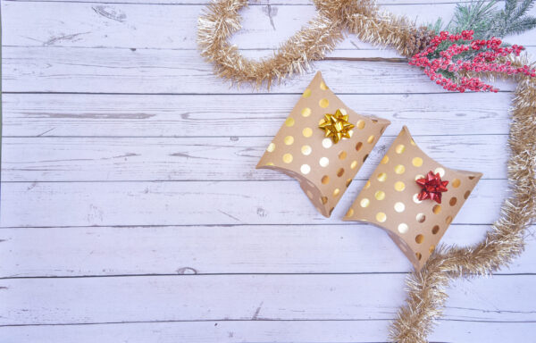 christmas gifts placed on a wooden table backgroun 2026 03 20 00 18 04 utc