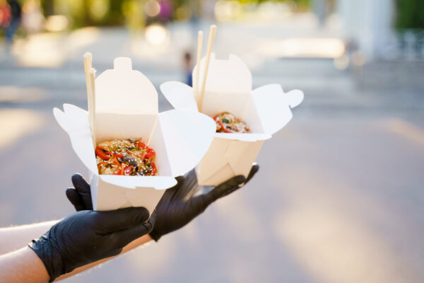 close up man eating spicy udon with chopsticks in 2026 04 05 00 17 08 utc