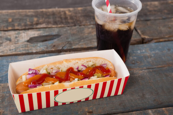 close up of hot dog and cold drink on wooden table 2026 03 26 11 48 15 utc