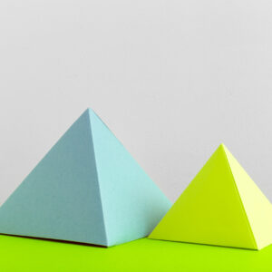 colorful geometric shapes on a bright green surfac 2026 03 26 10 35 37 utc