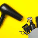 composition with hairdresser accessories on yellow 2026 03 24 21 57 35 utc