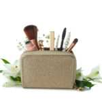 cosmetic bag with cosmetics and flowers isolated o 2026 03 24 23 47 44 utc