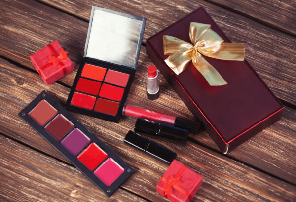 cosmetics and gift box on woodent table 2026 03 09 07 15 50 utc