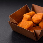 delicious fresh crispy chicken nuggets on a dark c 2026 03 16 03 18 06 utc