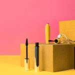 different mascaras and eyelash curler on yellow ba 2026 03 27 00 52 43 utc