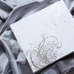 elegant album on silver silk fabric 2026 01 08 02 29 44 utc