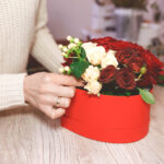 flower shop florist woman making box with red rose 2026 01 05 06 20 55 utc