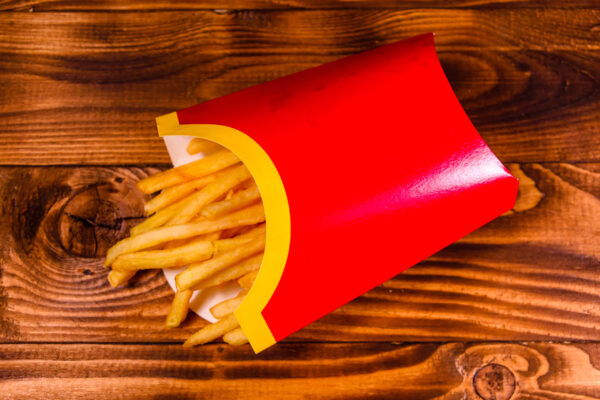 french fries in red box on rustic wooden table to 2026 03 26 03 47 54 utc (1)