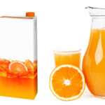 fresh orange juice in a glass and carton box 2026 01 05 23 06 15 utc