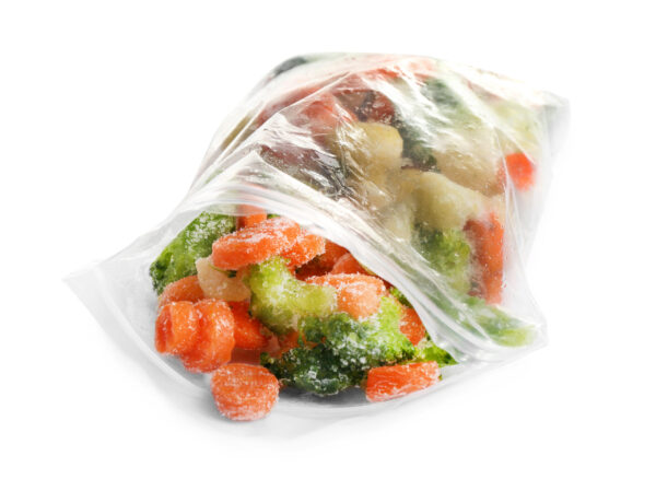 frozen vegetables in plastic bag isolated on white 2026 03 26 23 59 33 utc