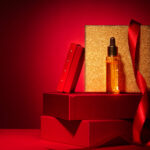 gold cosmetics on red podium with gift boxes and d 2026 03 19 23 09 39 utc
