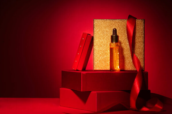 gold cosmetics on red podium with gift boxes and d 2026 03 19 23 09 39 utc