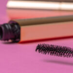 gold tube of mascara close up on pink background 2026 03 24 11 38 05 utc