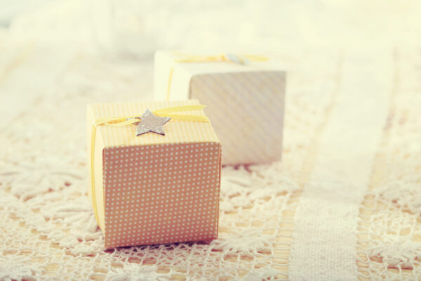 hand made present boxes with yellow ribbons and st 2026 03 27 02 01 59 utc