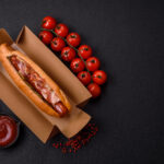 hotdog with grilled sausage with bacon and mushroo 2026 03 17 00 31 04 utc