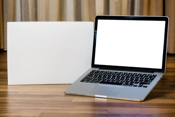 laptop with blank screen on wooden table and blurr 2026 01 05 06 13 28 utc