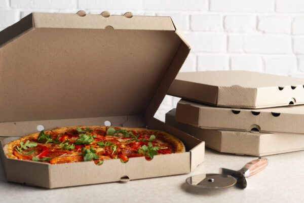 large pizza in open carton box and cutter on kitch 2026 01 08 21 50 21 utc