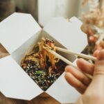 man eats asian fast food 2026 03 16 01 22 29 utc