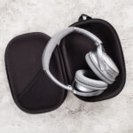 modern silver wireless headphones on concrete back 2026 03 09 08 14 00 utc