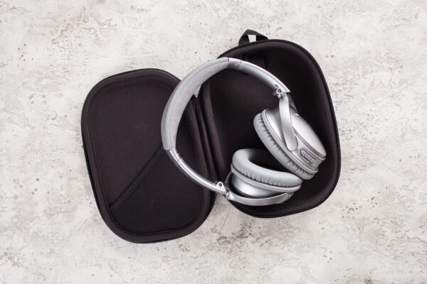 modern silver wireless headphones on concrete back 2026 03 09 08 14 00 utc
