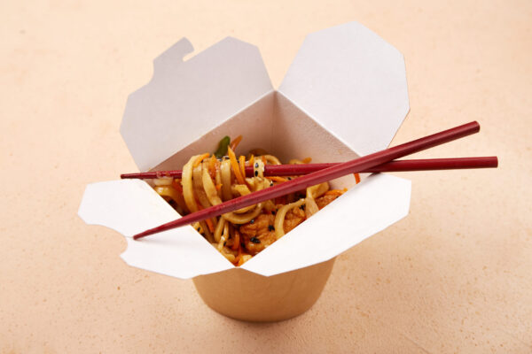 noodles served in takeout box with chopsticks on a 2026 03 27 00 47 52 utc (1)