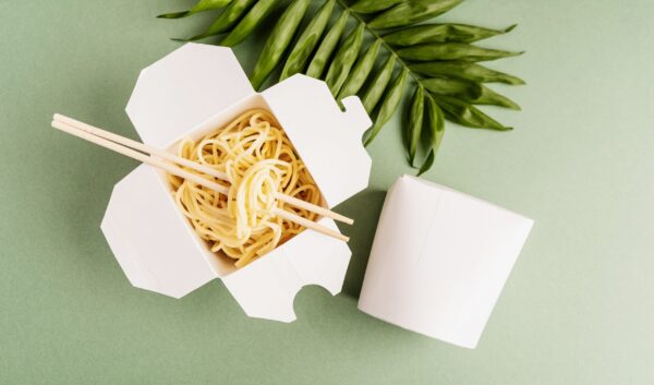 opened wok paper box with noodles and chopsticks 2026 01 08 23 43 56 utc (1)