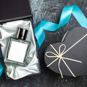 overhead view of blue ribbon on man perfume in a g 2026 03 18 11 51 14 utc