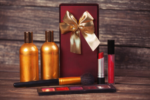 perfume and gift box on wooden table 2026 03 09 07 17 14 utc
