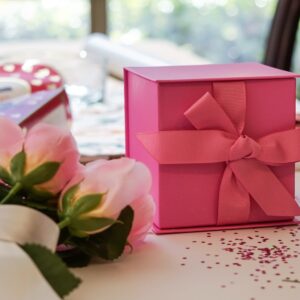 pink box with a pink bow and flowers 2026 03 24 05 31 07 utc