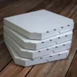 pizza boxes on vintage wooden planks mock up 2026 03 19 22 05 22 utc