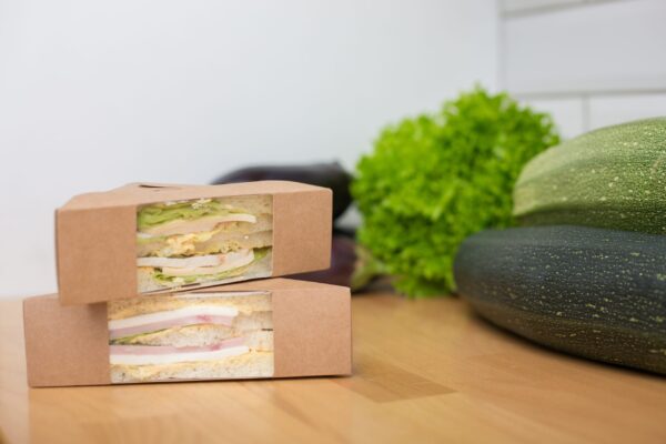 proper nutrition a sandwich lies on a wooden table 2026 03 16 02 45 27 utc