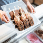 seller with ice cream on a stick 2026 03 24 23 57 49 utc