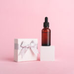 serum glass bottle with pipette and white gift box 2026 03 10 01 00 16 utc