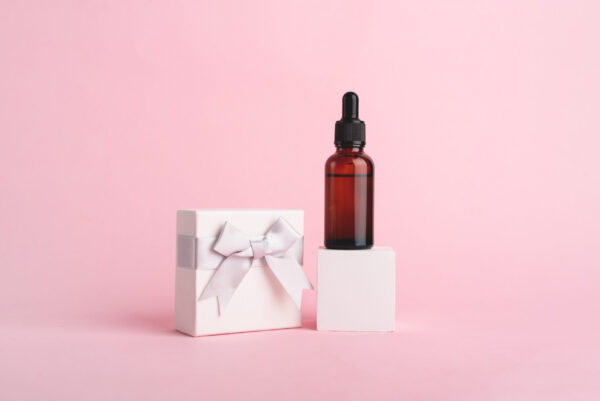 serum glass bottle with pipette and white gift box 2026 03 10 01 00 16 utc