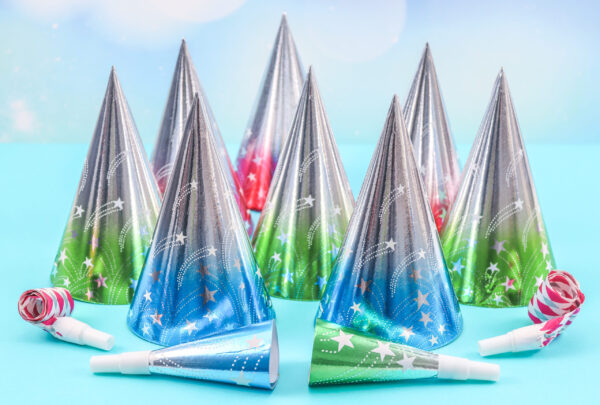 set of cone hats and birthday whistles on a blue b 2026 03 24 10 04 39 utc