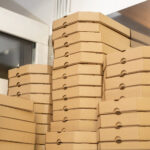 stack of pizza boxes cardboard brown pizza delive 2026 03 17 08 51 15 utc
