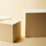 still life of cubes in different sizes on beige su 2026 01 06 00 35 05 utc