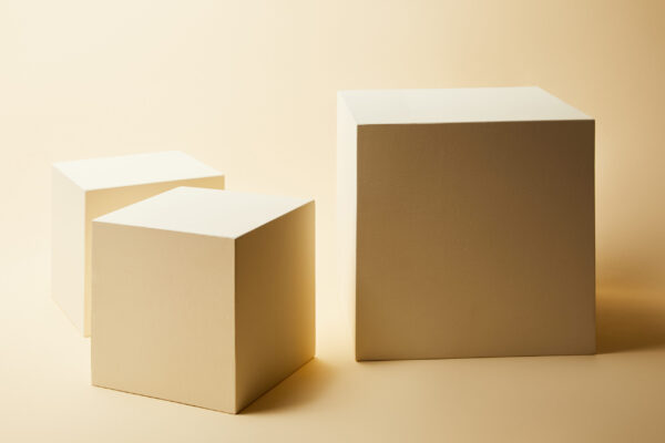 still life of cubes in different sizes on beige su 2026 01 06 00 35 05 utc