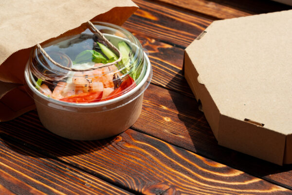 take out poke bowl on wooden background 2026 03 19 08 14 28 utc