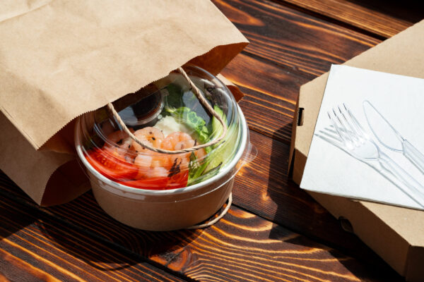 take out poke bowl on wooden background 2026 03 24 10 27 15 utc