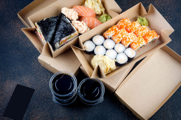 tasty sushi rolls in disposable kraft paper boxes 2026 03 23 23 51 41 utc