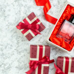 top view holiday gifts perfume bottle on grey back 2026 03 18 10 38 18 utc