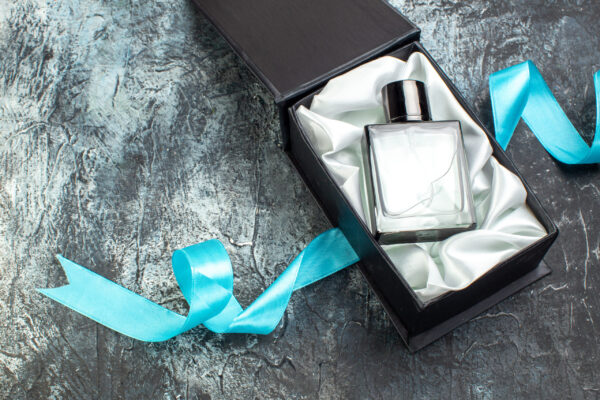 top view of blue ribbon on man perfume in a gift b 2026 03 18 13 46 55 utc