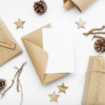 top view of wrapped gifts pine cones and merry c 2026 03 18 07 58 06 utc