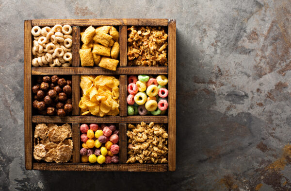 variety of cold cereals in a wooden box overhead 2026 03 24 01 20 19 utc
