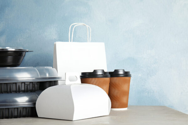 various takeout containers on table space for tex 2026 03 08 23 01 35 utc (1)