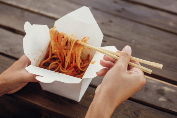 wok with noodles and vegetables in carton box to g 2026 01 09 10 44 11 utc