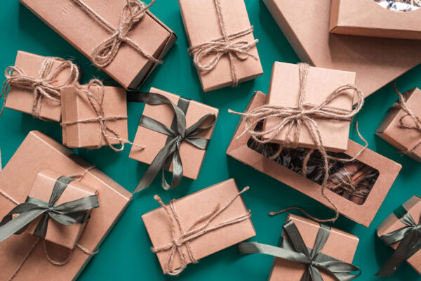 wrapped presents with bows background on teal surf 2026 03 20 06 14 36 utc